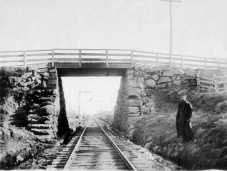 Isaac Hedge at the Howlands Lane railroad bridge, no date.